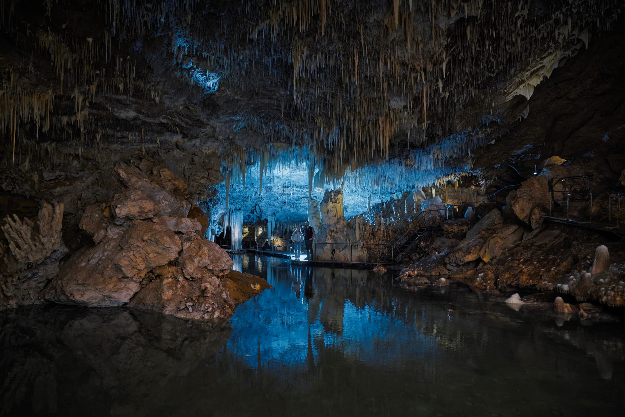 Inside lake cave, backlit with beautiful blue light