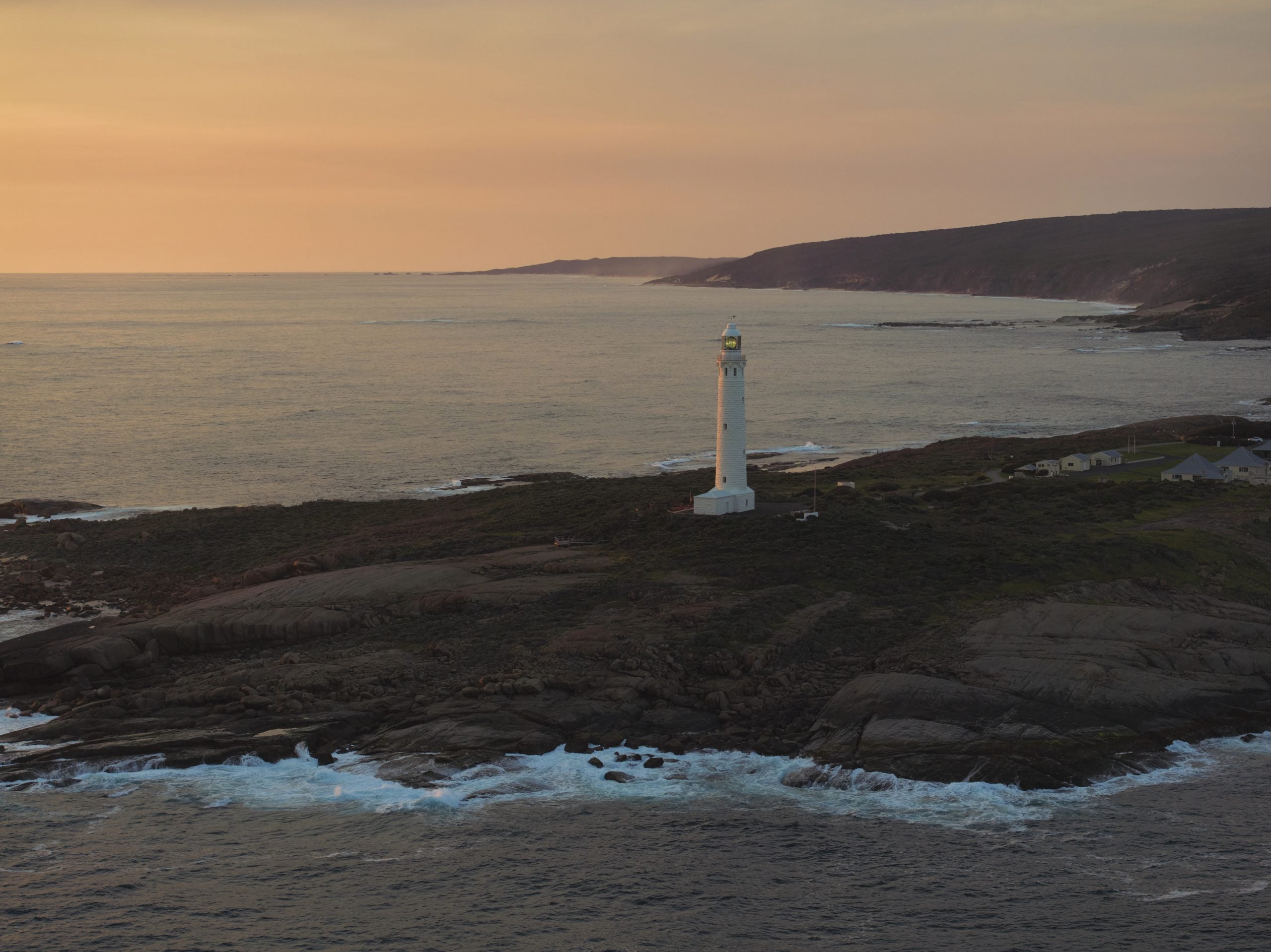 An aerial view of Cape Leeuwin Lighthouse at dusk