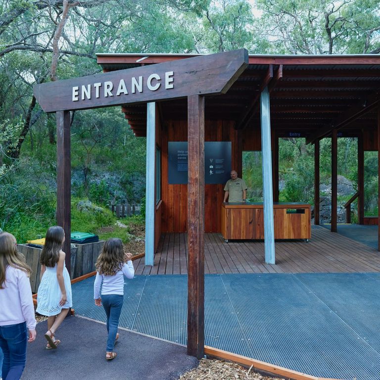 Family arrive at the entrance to Ngilgi Cave Ancient Lands above ground experience