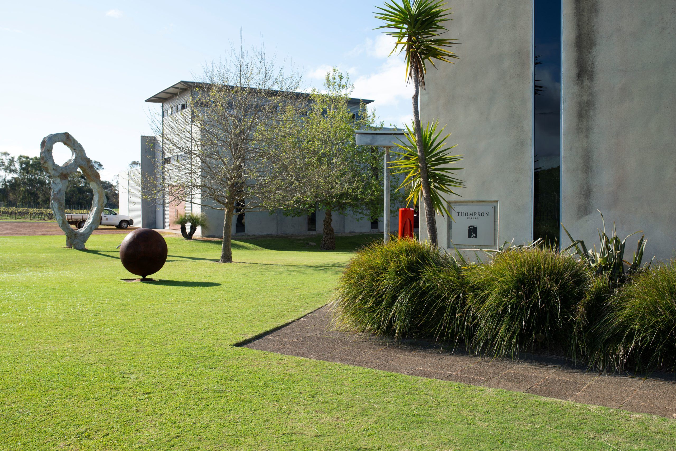 Lawn at Thompson Estate cellar door in Wilyabrup, with sculptures on the lawn.