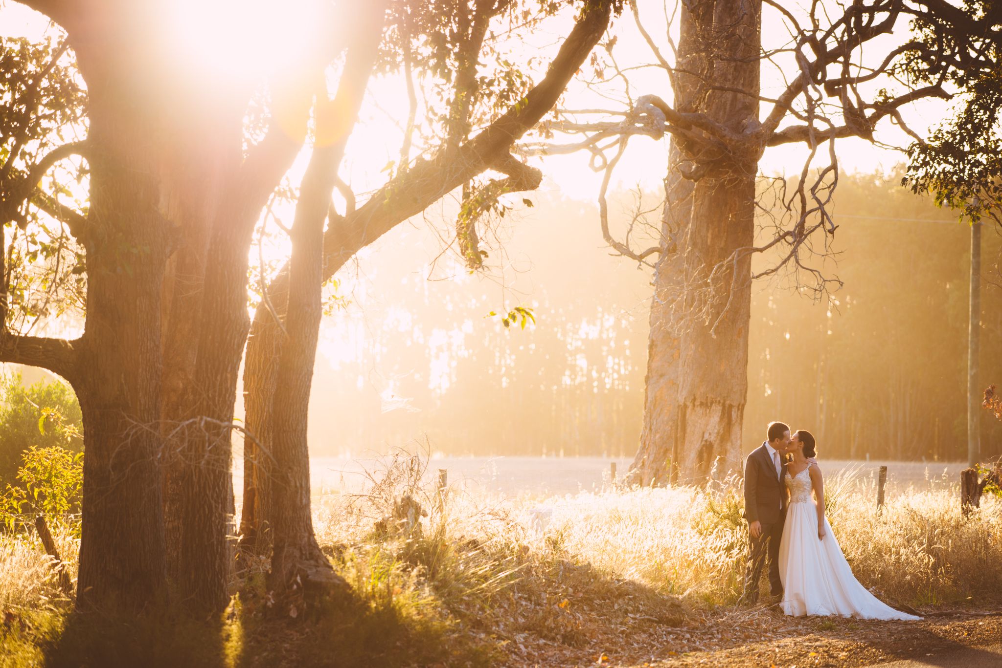 Wedding couple at sunset. Credit Russell Ord.
