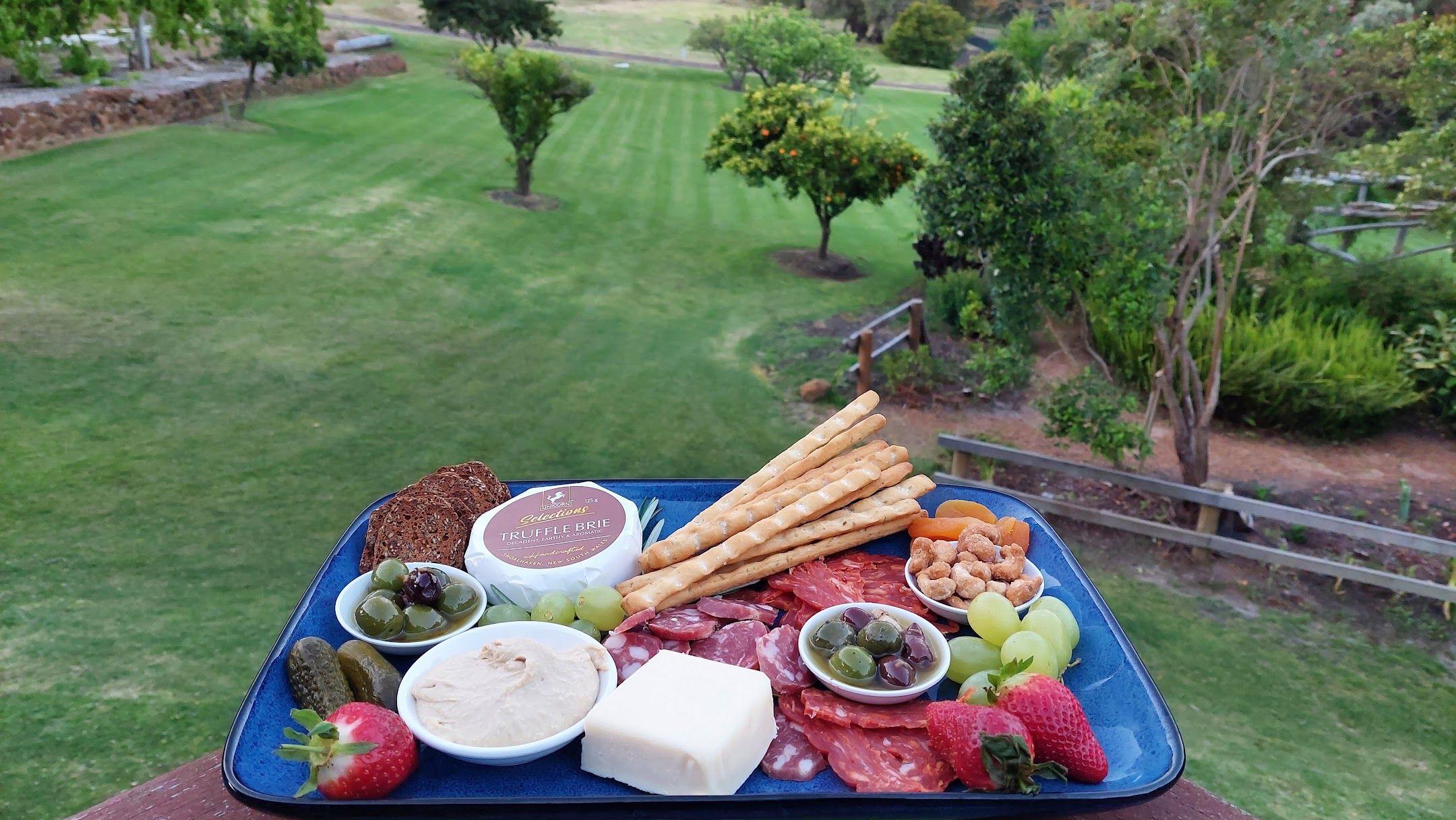Gourmet platter overlooking the gardens at Rivendell Estate.