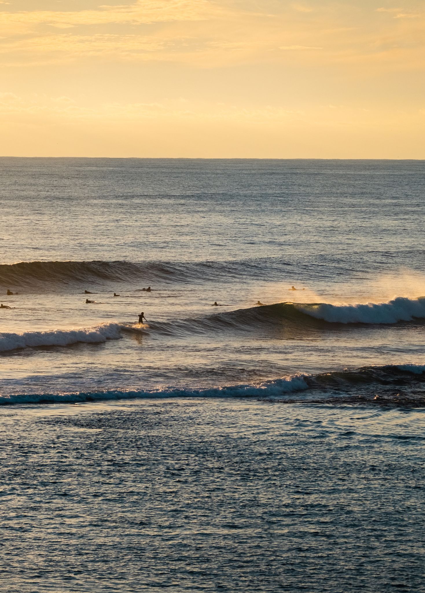 Surfers at sunset in Yallingup. Credit Rachel Claire