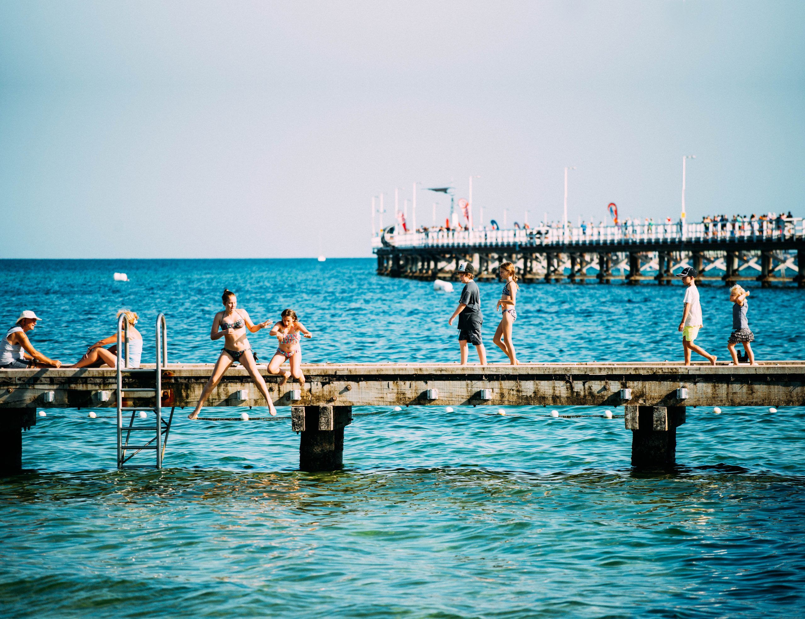 People swimming at Busselton Jetty. Credit Elements Margaret River.