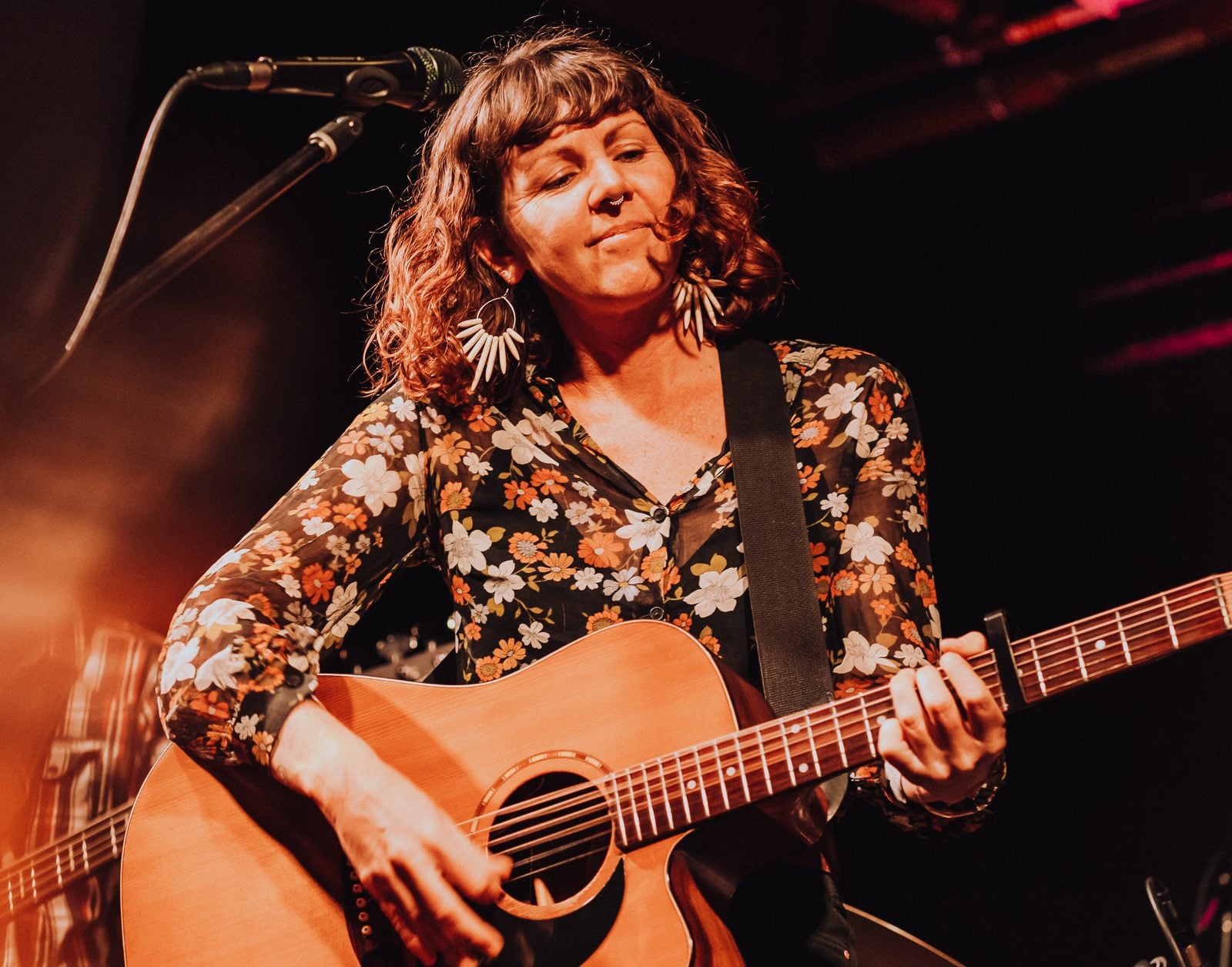 Tanya Ransom performing with her guitar