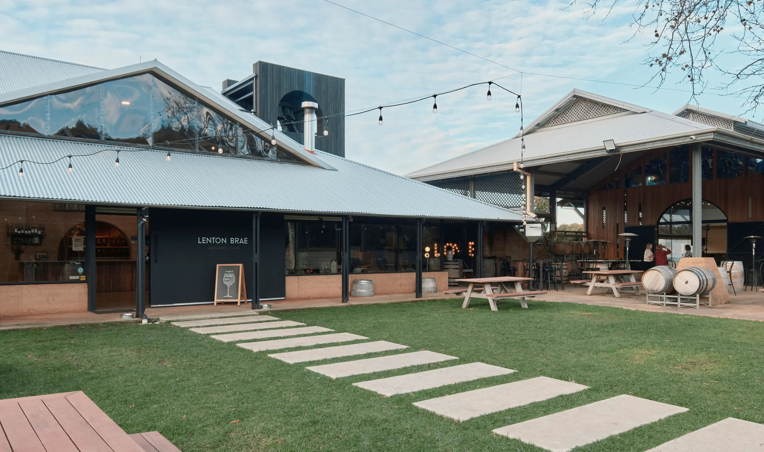Lenton Brae cellar door building with plenty of lush green lawn.