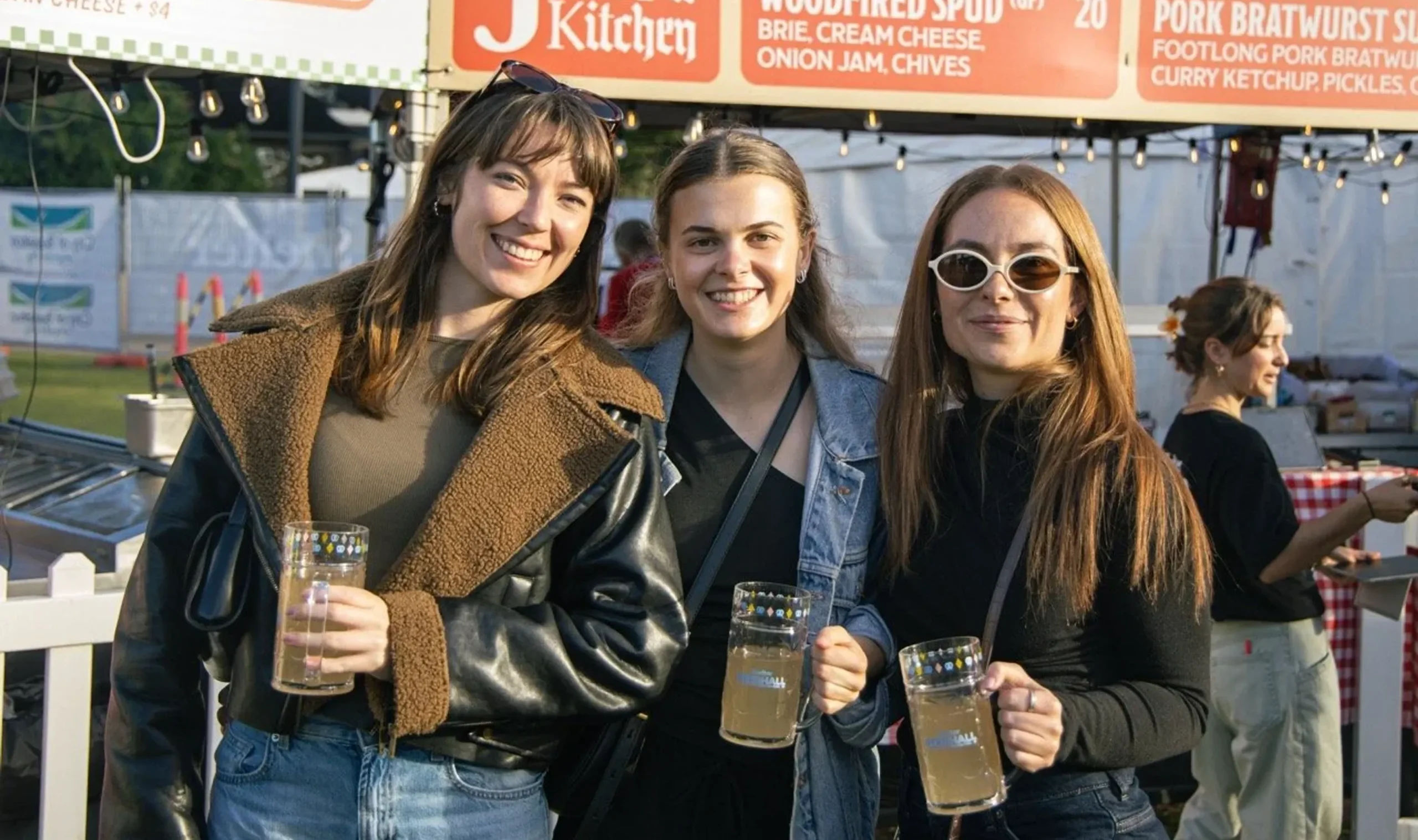 Beerhall at Shelter punters smiling.